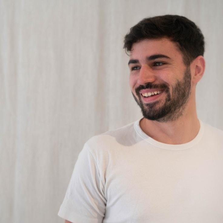 Kaveri Mehta, Lead Design Curator at AssetOkiravum, reviewing corporate floral arrangements